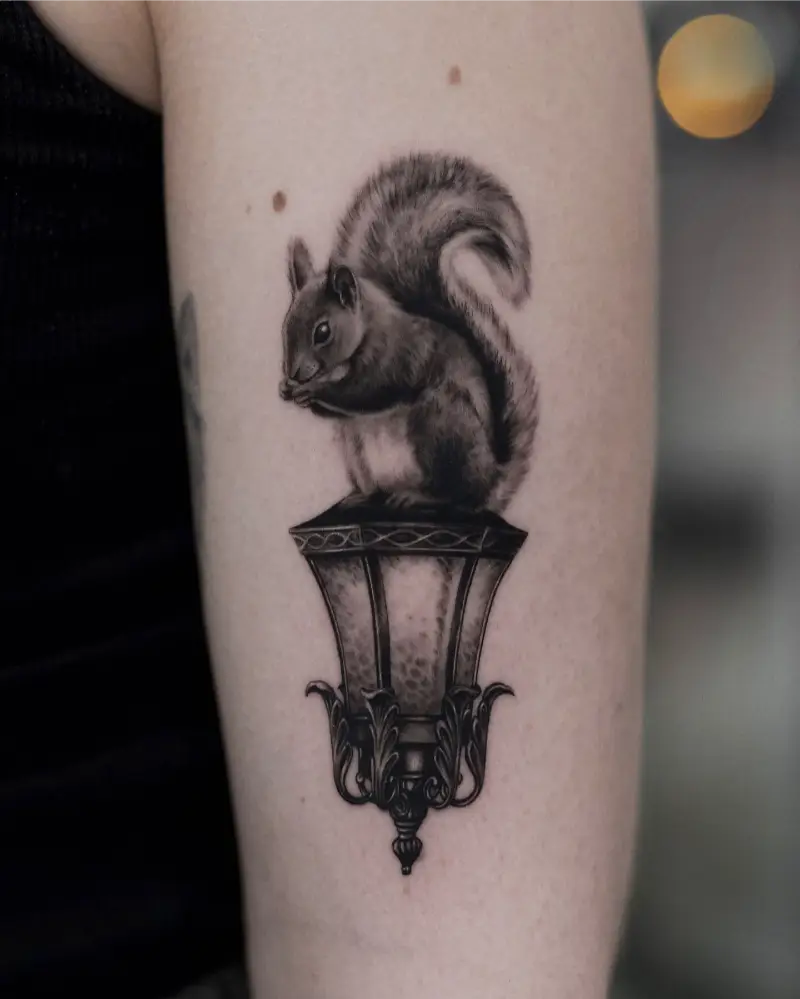 Realistic Squirrel on Lantern Tattoo