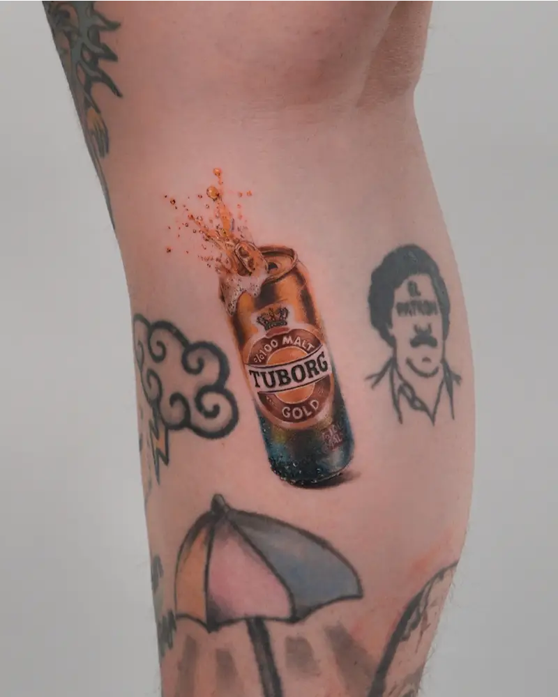 Realistic Tuborg Gold Splash Can Tattoo