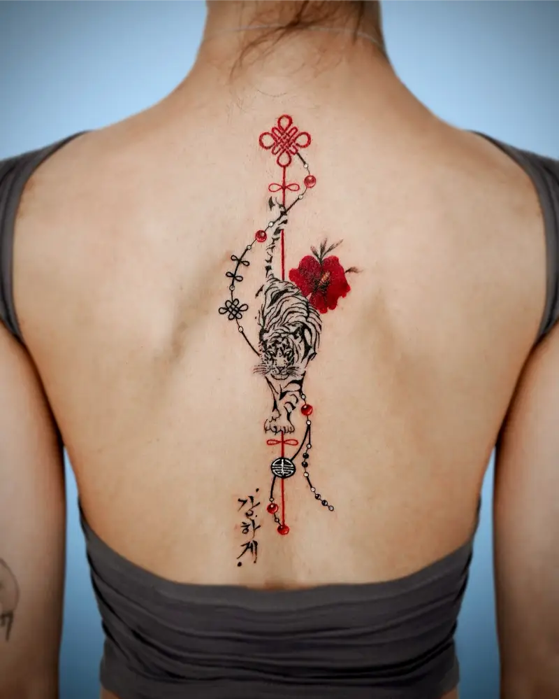 Red Hibiscus & Tiger Spine Tattoo