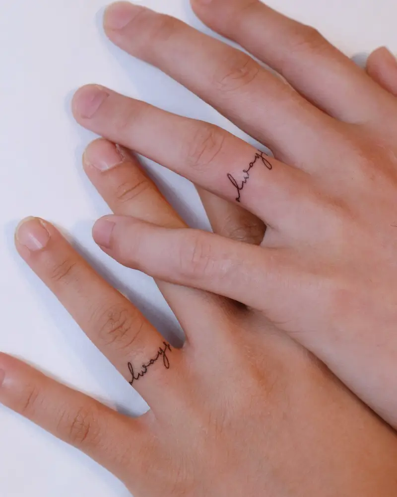 Script Love Wedding Ring Tattoo