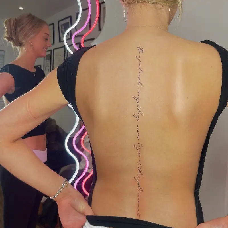 Script Spine Tattoo