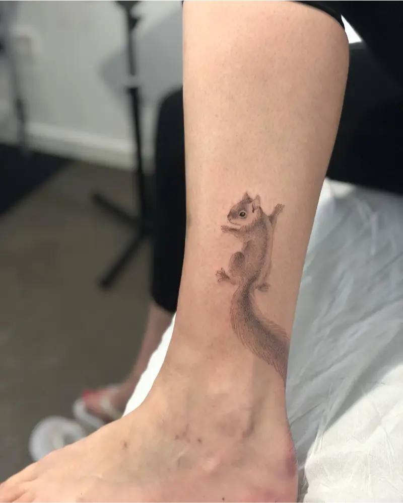 Tiny Climbing Squirrel Tattoo