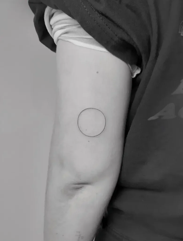 Tiny Minimal Circle Tattoo