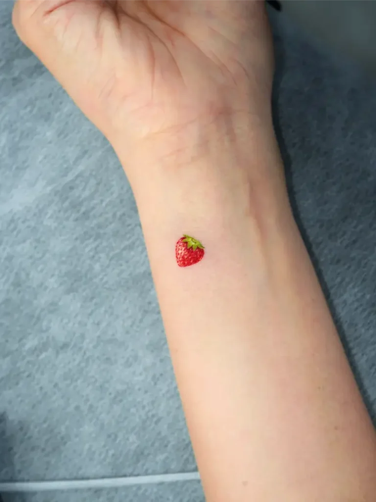 Tiny Minimal Realistic Strawberry Tattoo