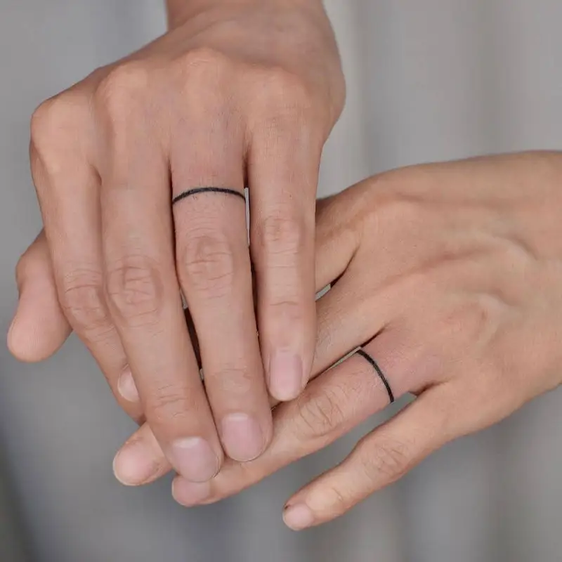 Ultra Fine Black Band Wedding Ring Tattoo