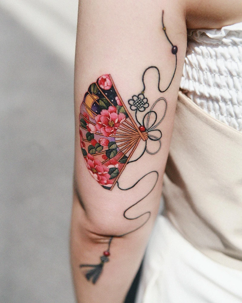 Vibrant Japanese Floral Fan Tattoo