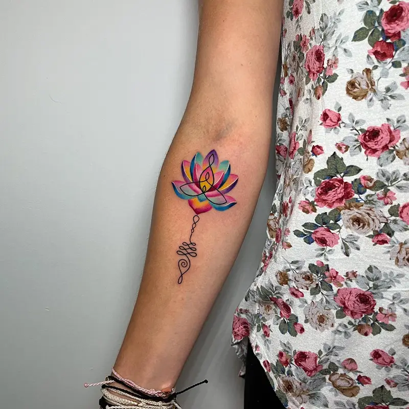 Vibrant Rainbow Lotus Unalome Tattoo