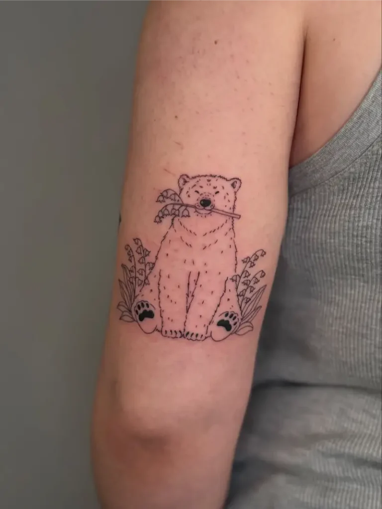 Whimsical Fine Line Polar Bear Cub Tattoo