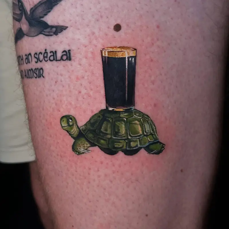 Whimsical Turtle and Stout Pint Tattoo